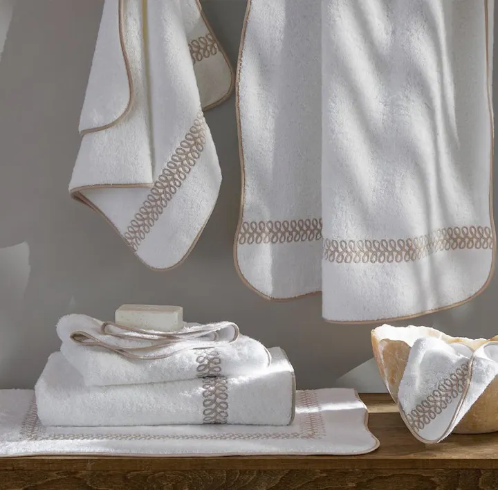 An assortment of Classic Chain Towels in Dune