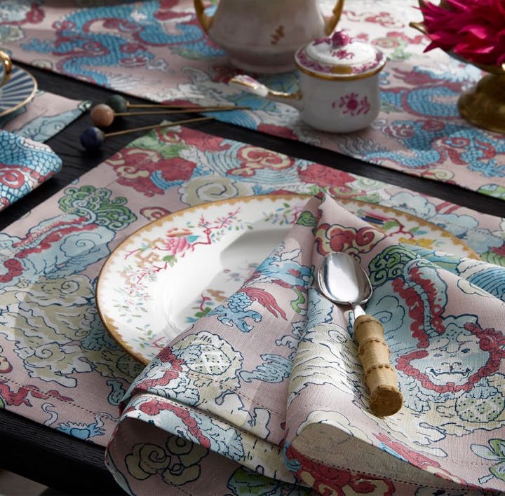 A closeup of a place setting featuring Magic Mountain linens