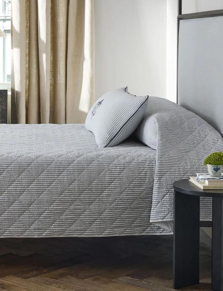 An view of a Matteo Bed with a Lumbar Pillow