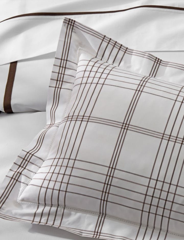 A closeup view of August Plaid bed linens
