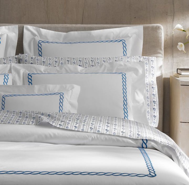 A bed featuring Classic Chain linens