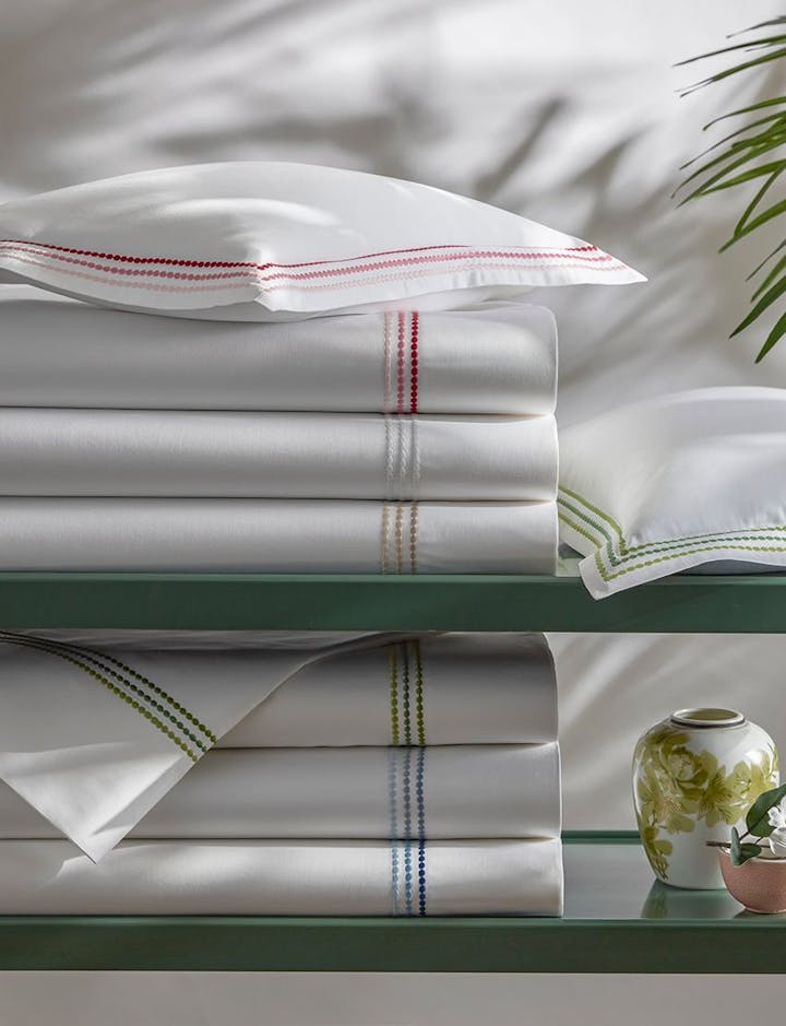 A stack of Amara Triple Pearl sheeting, showing the various colors available.