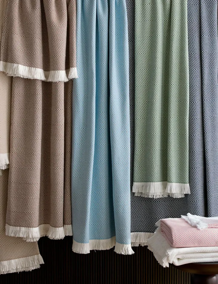 A view of hanging Leo Throws