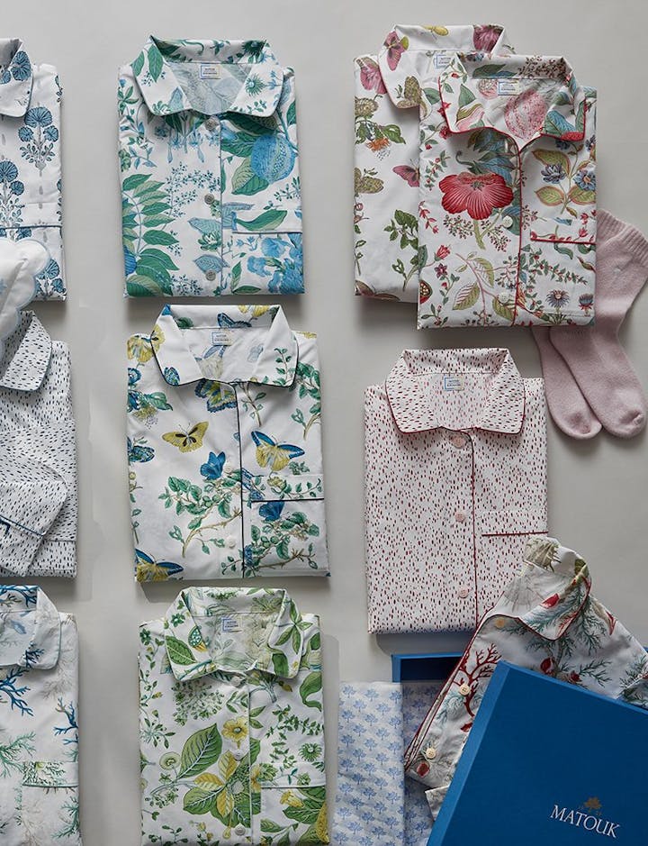 A selection of our pajama styles, shown with a gift box.