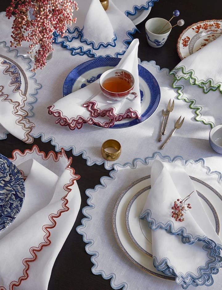 An overhead view of a table featuring Wave linens