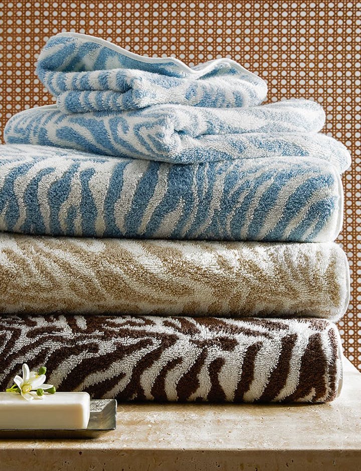 A stack of Regine towels, showing all three colors.