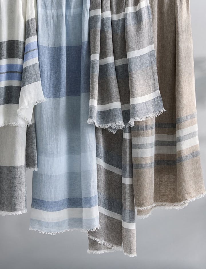 A photo of Como 360 throws draped together.