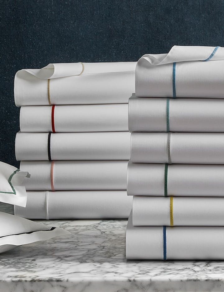 A view of Bergamo bed linens in an array of colors.