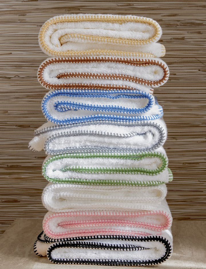 A stack of colorful Whipstitch towels