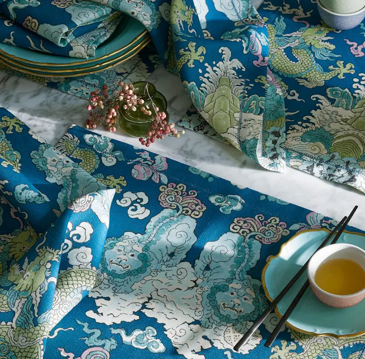 A closeup of a place setting featuring Magic Mountain linens